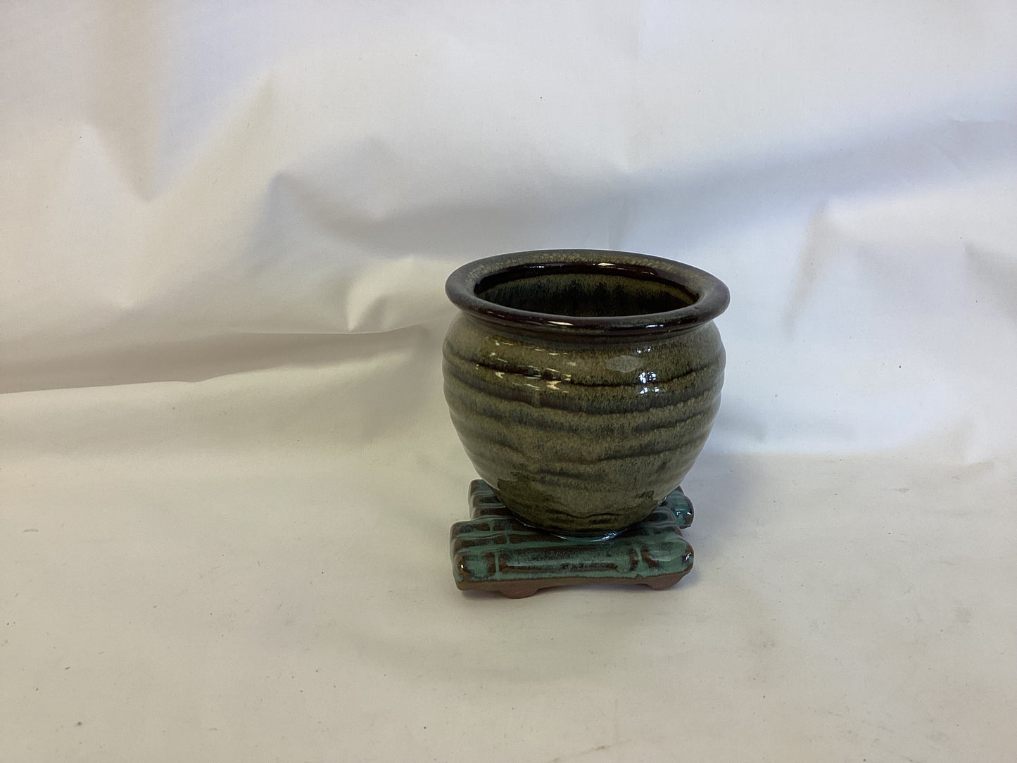 Clay Pottery Vase Mounted on Bamboo Planter