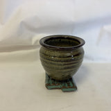 Clay Pottery Vase Mounted on Bamboo Planter